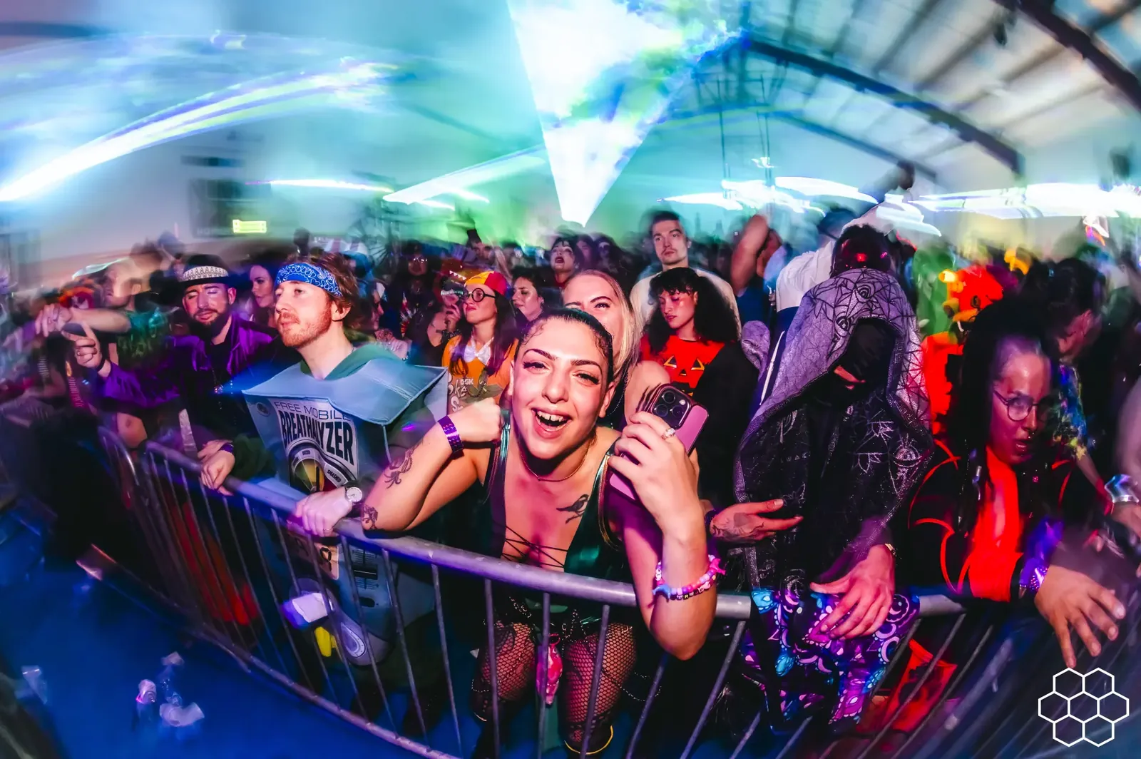 The rail at a past Dubaween, packed with costumed dancers under lasers